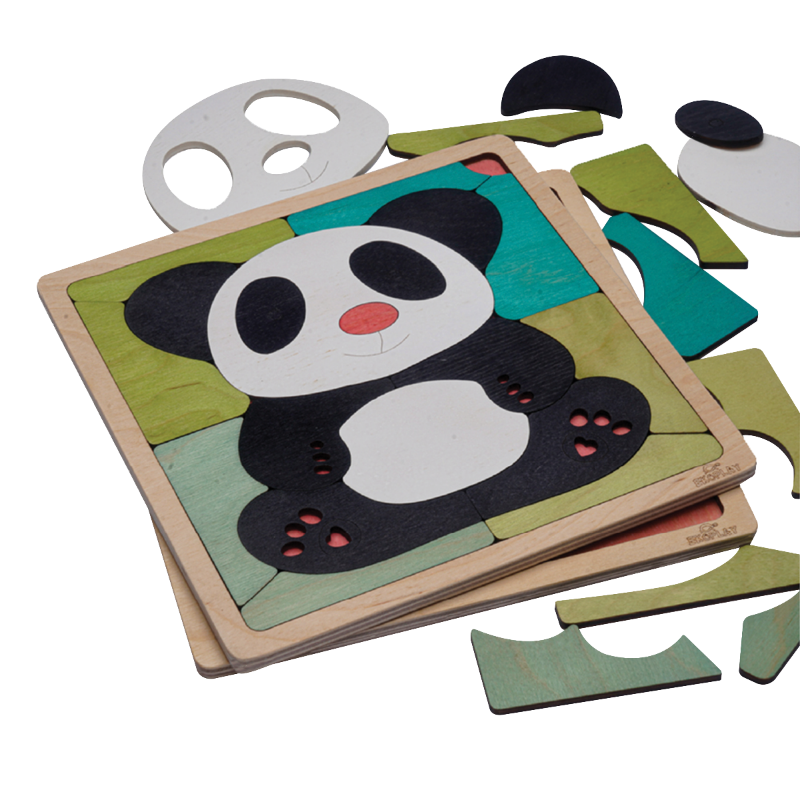 Wooden panda puzzle with missing pieces on a white background