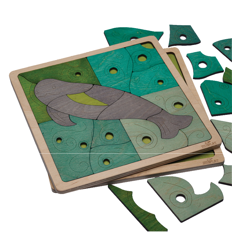 Wooden puzzle with turtle design on a white background